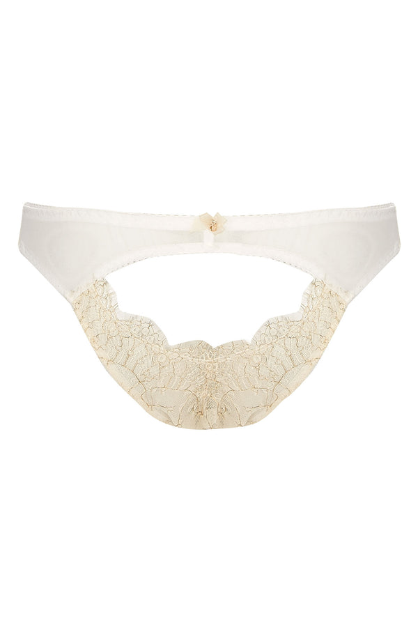 Back view of Edge o’ Beyond Evie lingerie brief created from ivory sheer tulle and intricate gold gilted lace. A playful rear peep makes this unique women’s underwear. Pair with a babydoll or negligee for perfect bridal look.